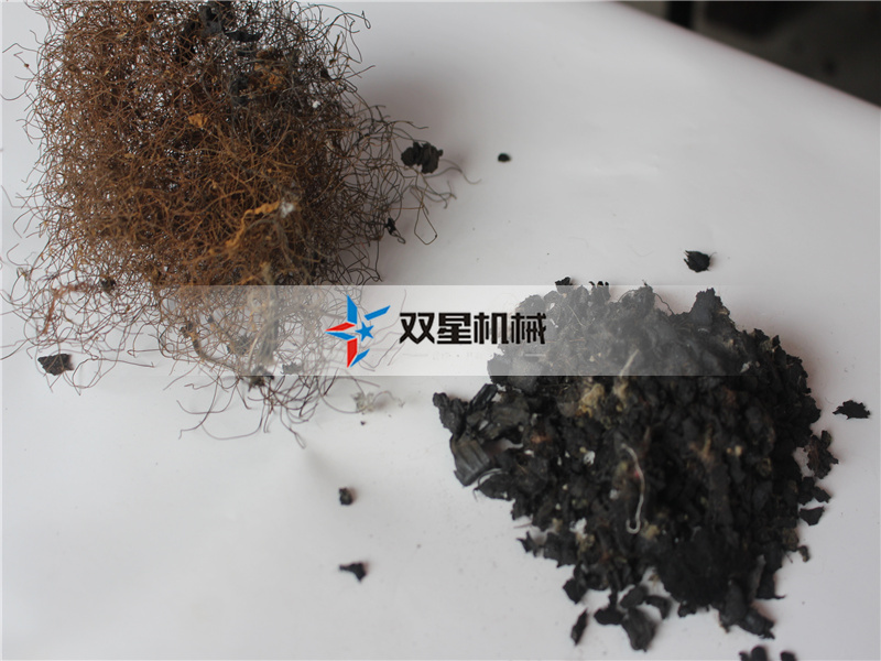 <a href='http://www.astimsrl.com/3/23.html' target='_blank'><span>轮胎撕碎机</span></a>撕碎物料现场实拍